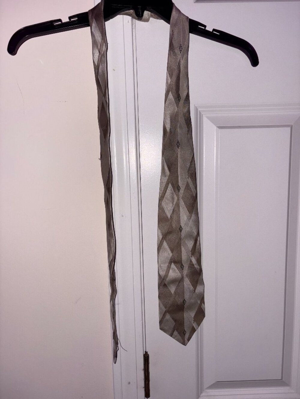 Pierre Cardin necktie, taupe brown and silver gray. Geometric diamond pattern